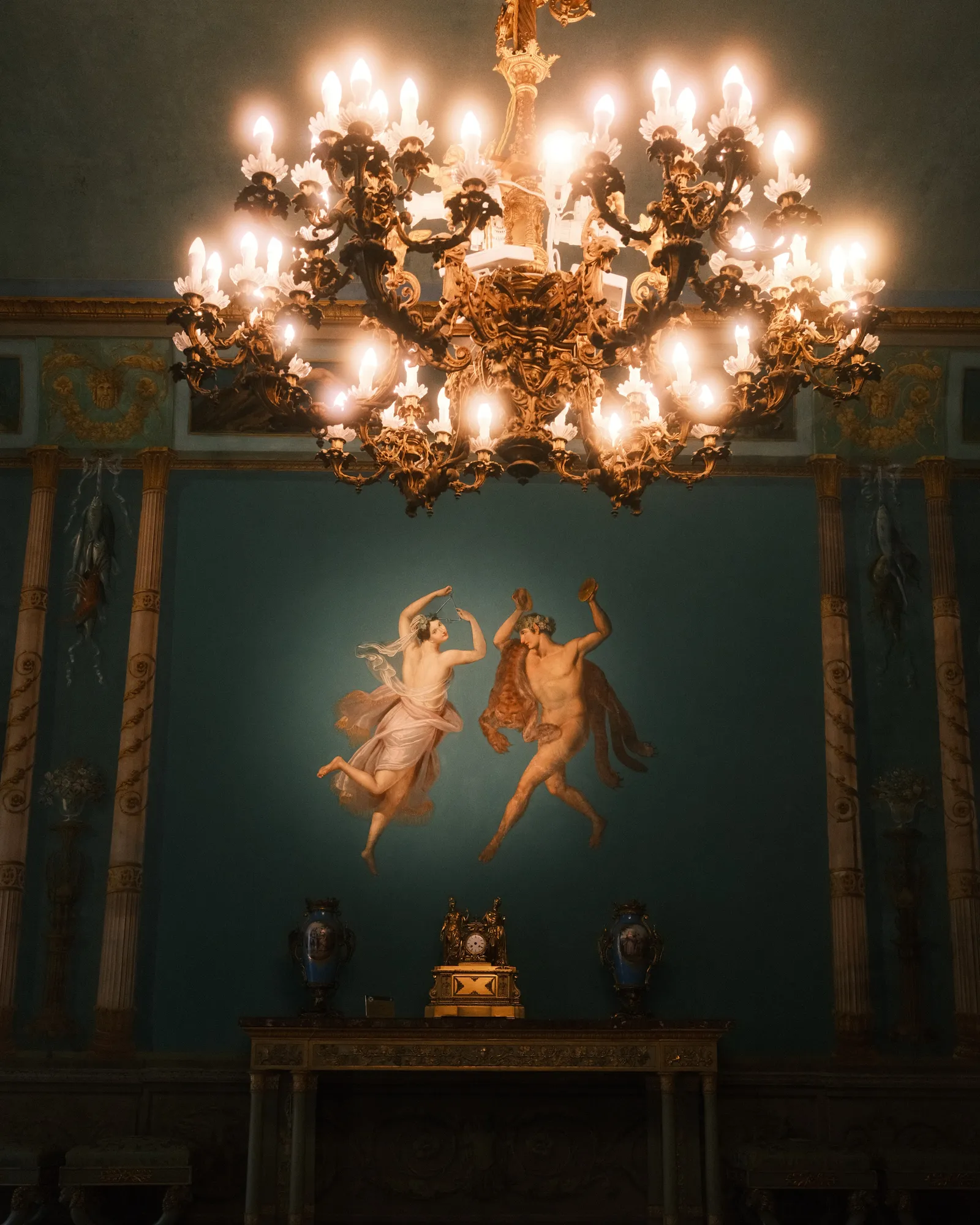 Painting from the Viceroy's Room in the Norman Palace, with a Murano glass chandelier hanging in the middle of the room