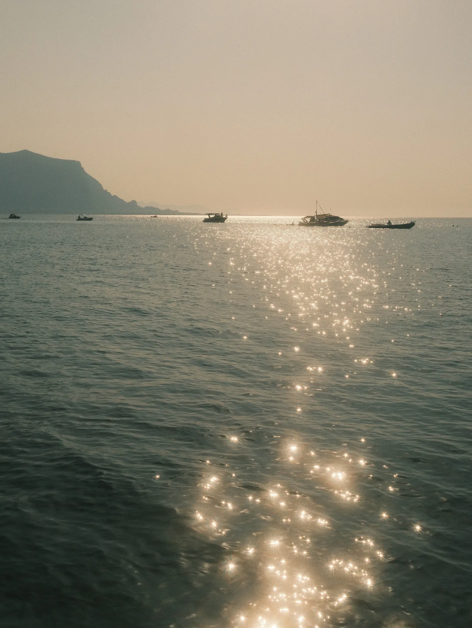 sun glitter over the sea in Isola delle Femmine, Sicily