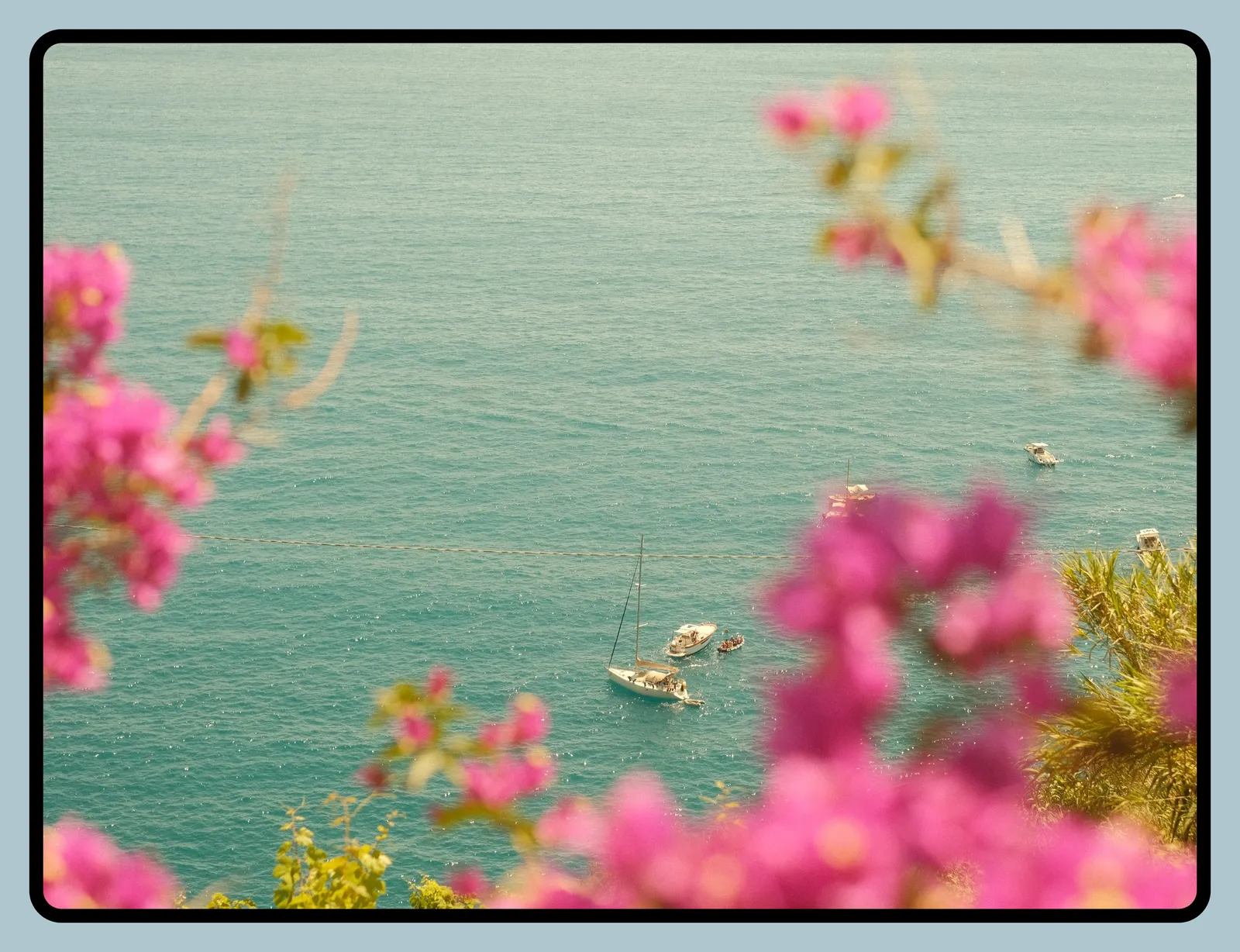 Italian coast during summer with a double border.