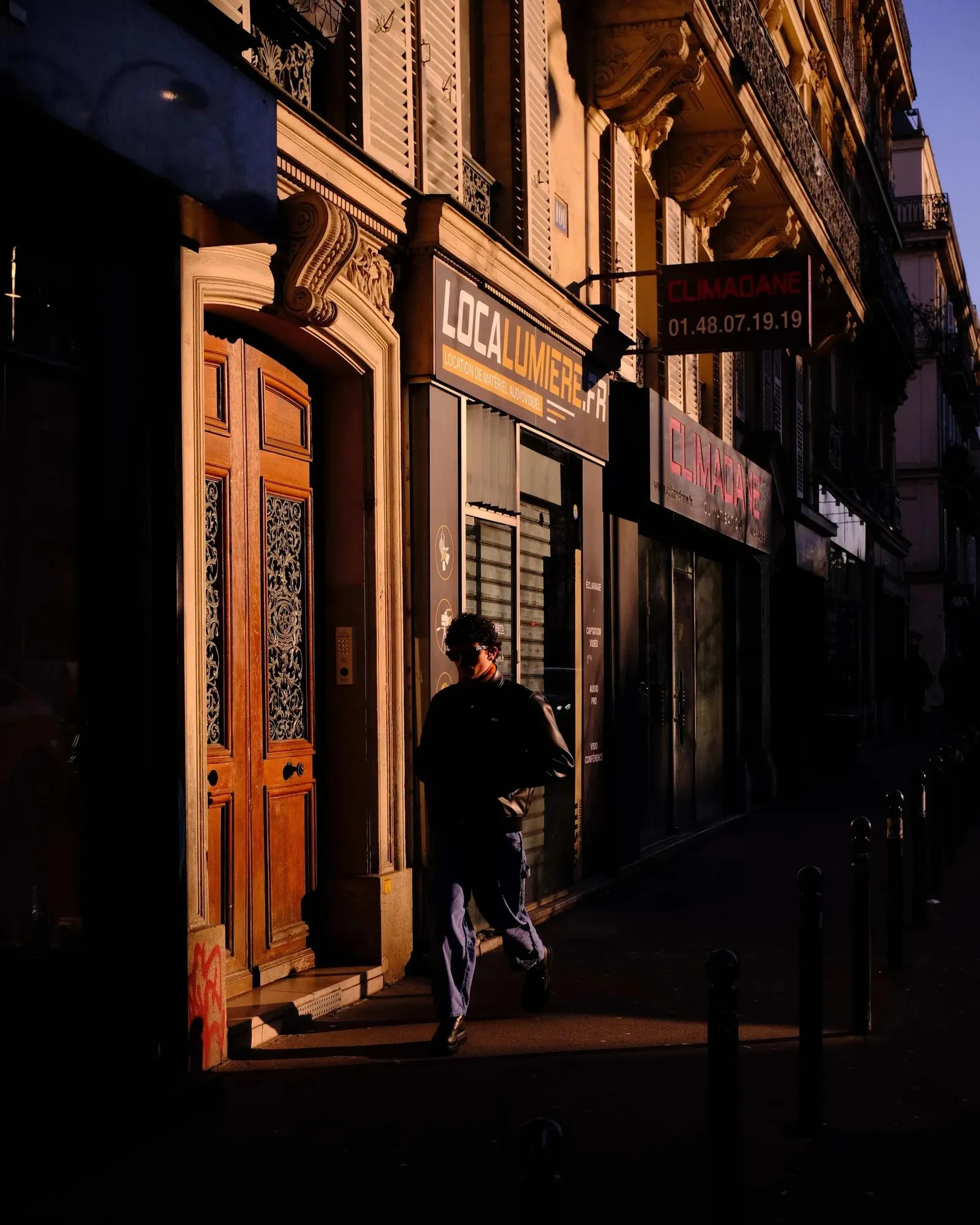 A sunset shot of a stranger in Paris, street photography.