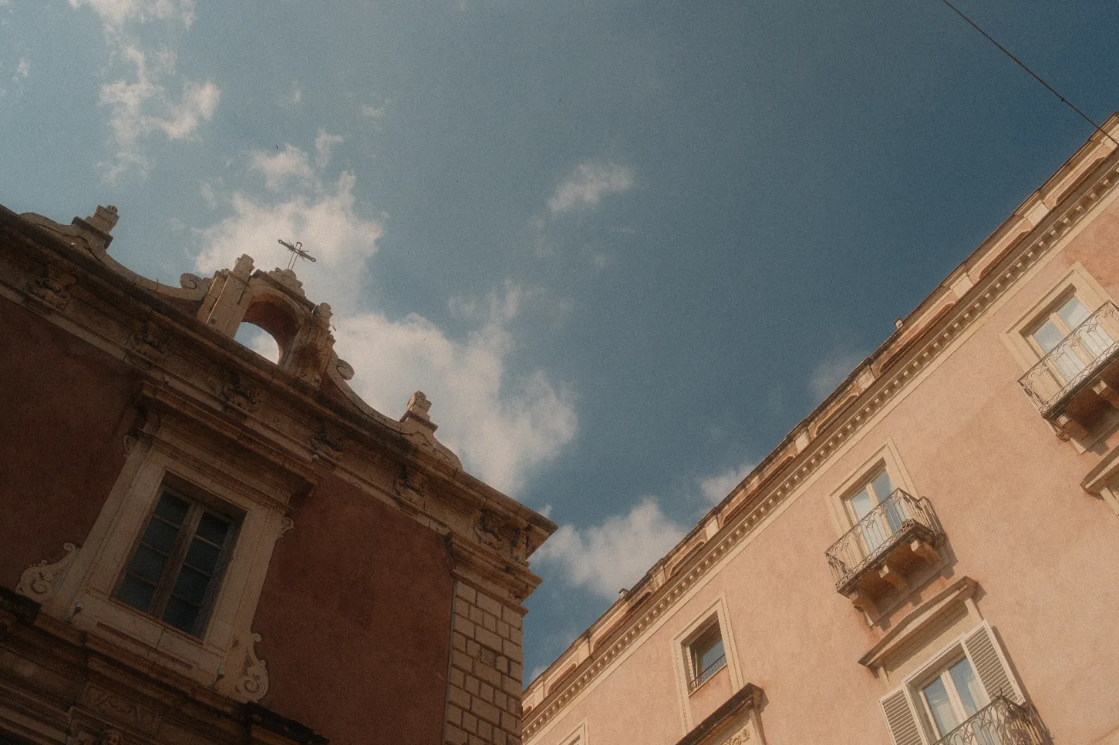 A corner street in Catania A corner street in Catania, Sicily - Summer Chrome fujifilm film recipe